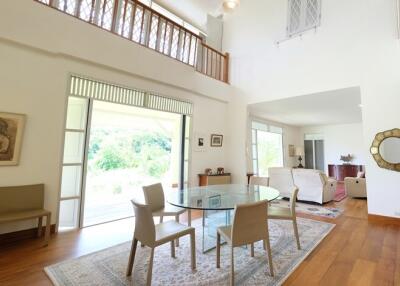 Spacious and bright living and dining area with high ceiling