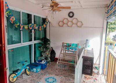 Balcony area with decorations and children