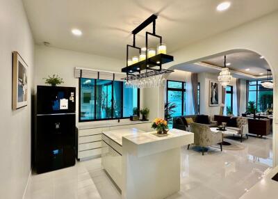 Modern kitchen with a view of the living area