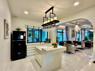 Modern kitchen with a view of the living area