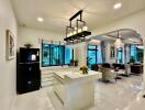 Modern kitchen with a view of the living area