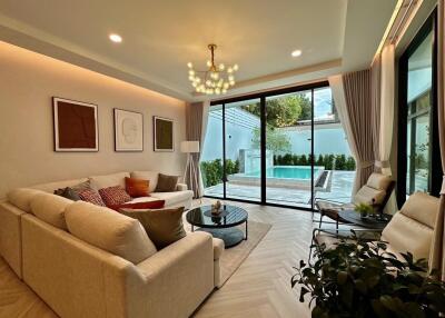 Modern living room with pool view