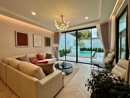 Modern living room with pool view