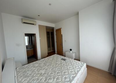 Spacious bedroom with en-suite bathroom and air conditioning