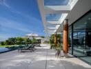 Modern outdoor patio with pool and seating