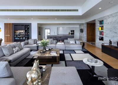 Modern living room with grey sofas and stylish decor