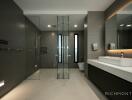 Modern bathroom with glass-enclosed shower and sleek design