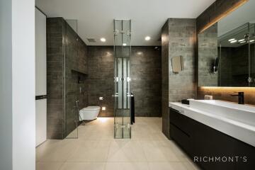 Modern bathroom with glass shower enclosure