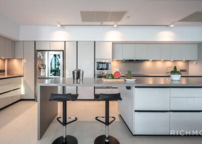 Modern kitchen with sleek design and high-end appliances