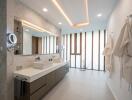 Modern bathroom with double sink vanity and large mirror