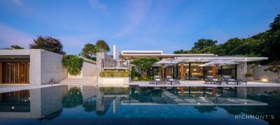 Modern luxury house with pool and outdoor lounge area