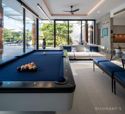 main living area with a pool table and seating