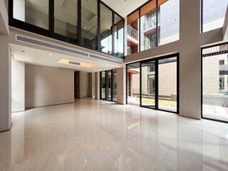 Spacious modern living room with large windows