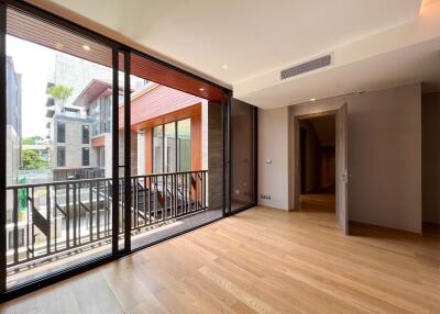 Spacious modern living area with large glass doors