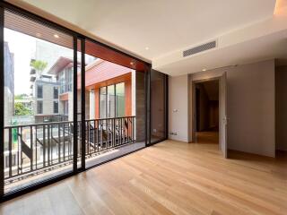 Spacious modern living area with large glass doors