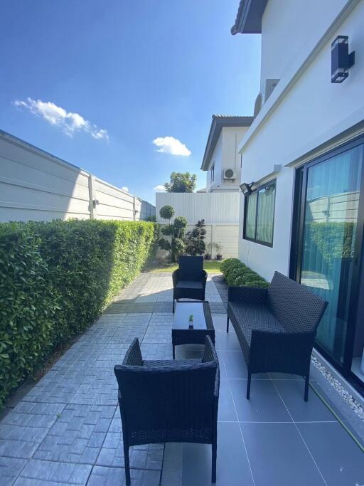 Outdoor patio with seating area and modern design