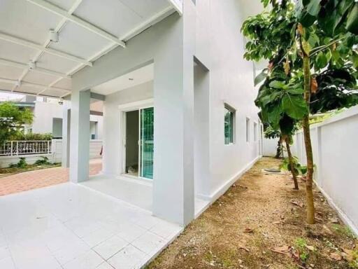 Modern house exterior with covered patio area