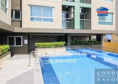 Condominium building with outdoor swimming pool