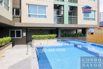 Condominium building with outdoor swimming pool