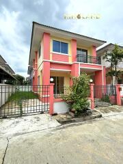 Front View of a House with Fence