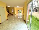 Spacious entry hallway with marble flooring and large windows