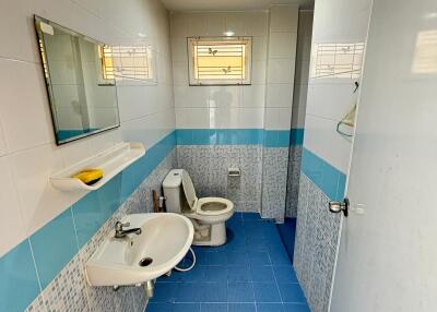 modern bathroom with blue tiled floor