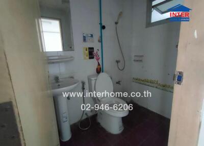 Bathroom with sink, toilet, and shower