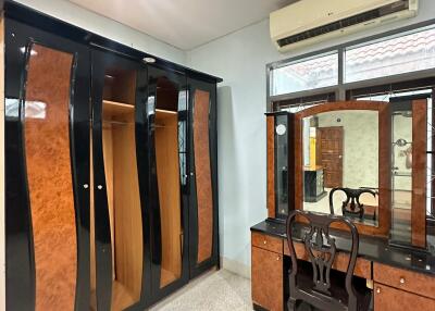 Bedroom with wardrobe and vanity table