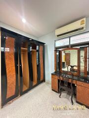 Bedroom with wardrobe and vanity table