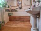 Bathroom with tiled flooring and wall shelving