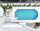 Aerial view of a swimming pool and relaxation area