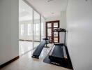 Fitness area with treadmill and exercise equipment