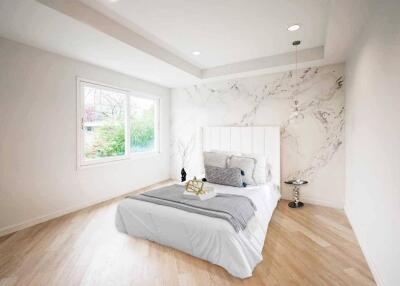 Modern bedroom with large window and stylish decor