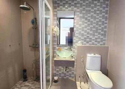 Modern bathroom with shower and toilet