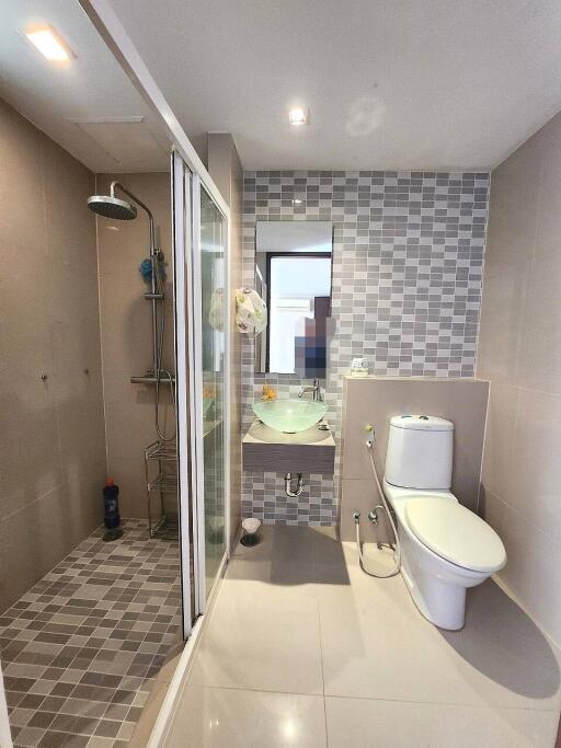 Modern bathroom with shower and toilet