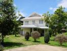 Two-story house with a garden