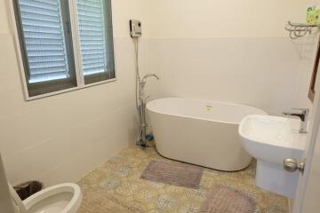 Modern bathroom with bathtub and sink