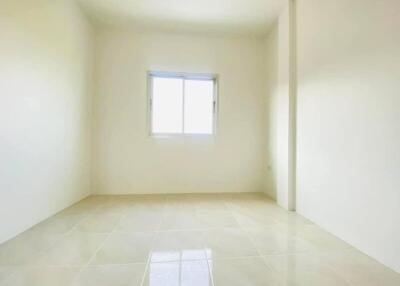 Empty bedroom with window