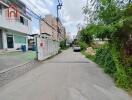 Street view of a residential area with buildings