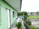 Outdoor corridor of building with greenery