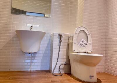 Modern bathroom with toilet and sink