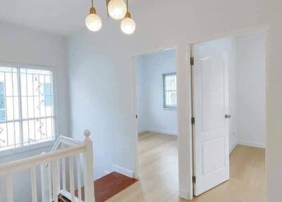 Bright and clean hallway with modern lighting