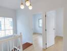 Bright and clean hallway with modern lighting