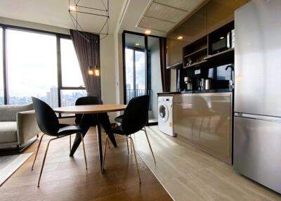 Modern kitchen and dining area with city view