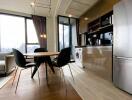 Modern kitchen and dining area with city view