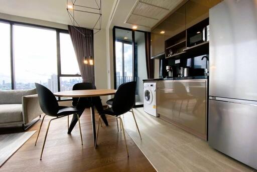 Modern kitchen and dining area with city view