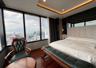 luxurious bedroom with city view