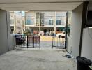 View from inside a garage towards a residential street