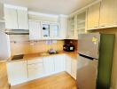 Modern kitchen with wooden cabinets and appliances