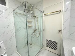 Modern bathroom with glass shower enclosure